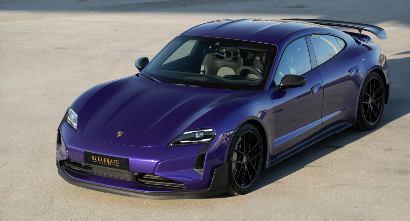 Porsche Taycan Turbo GT in purple with Xcelerate Motors plate at our Dubai location